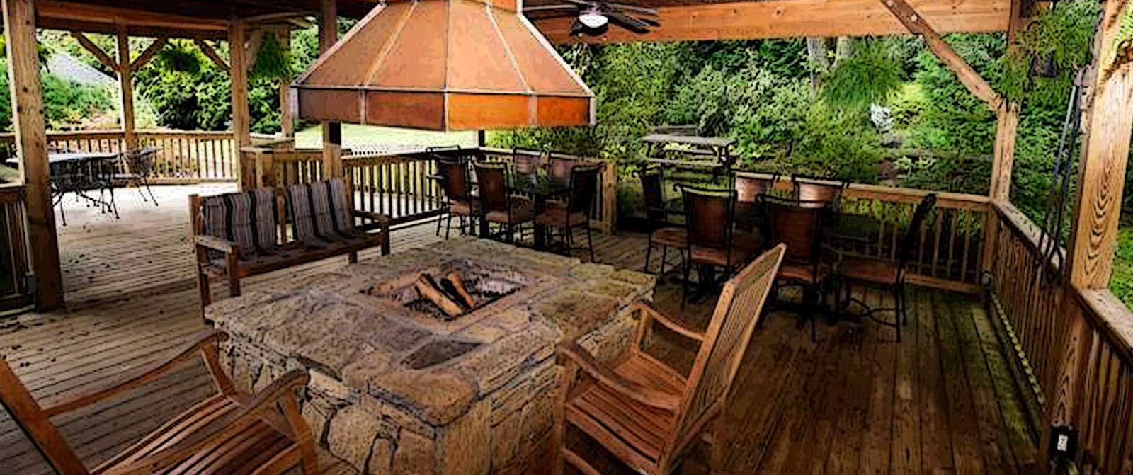 The Pavilion deck with its outdoor fireplace by the creek