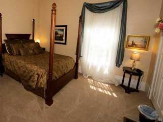 The Bush Room, a four poster bed on the ground floor
