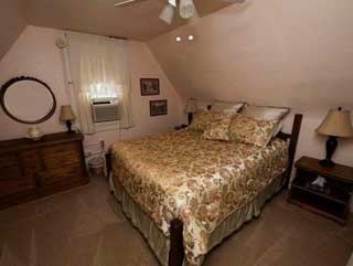 The Patton Room suite bedroom in the oldest part of the house